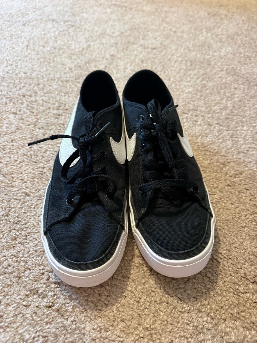 Nike Black Canvas Low-Top Sneakers with White Swoosh